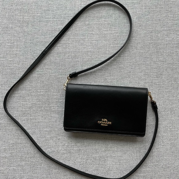 Coach Handbags - Coach clutch with cross-body strap, like new!